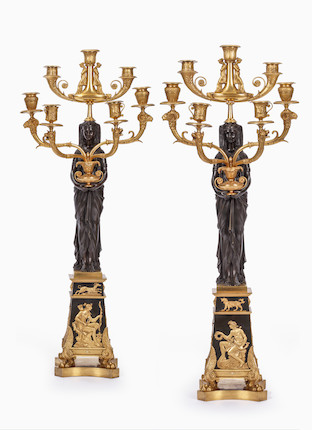 A pair of fine and impressive Empire 'Retour D'Egypt' gilt and patinated bronze seven light figural candelabra Possibly attributable to Pierre-Philippe Thomire, early 19th century (2) image 1