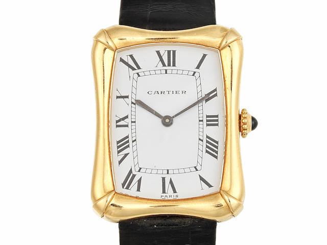 Cartier. An 18K gold manual wind wristwatch  Bamboo Coussin, Circa 1970