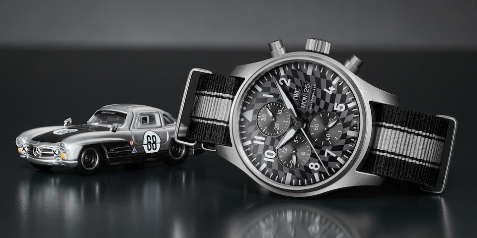 Offered for charity a Limited Edition titanium IWC Pilots Watch Chronograph wristwatch and Hot Wheels&#8482; model car coming in a unique collectors set