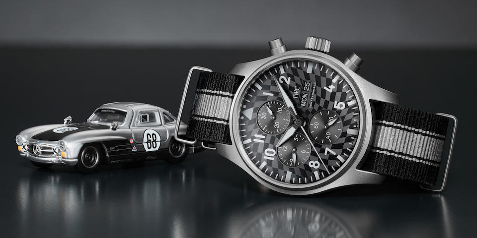 Offered for charity a Limited Edition titanium IWC Pilots Watch Chronograph wristwatch and Hot Wheels&#8482; model car coming in a unique collectors set