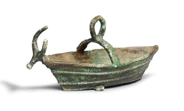 A Sardinian bronze boat-shaped lamp
