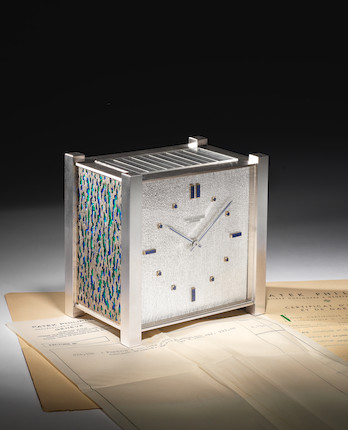 A fine and very rare 20th century enamel-decorated solar powered rhodium plated mantel timepiece with original paperwork.   Patek Philippe, 874536. Circa 1973. image 2