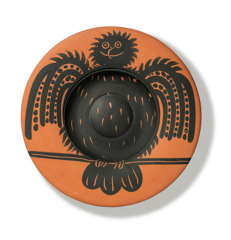 Pablo Picasso (1881-1973) Hibou noir perch&#233; stamped, marked and numbered Edition Picasso/Madoura Plein Feu/Edition Picasso / 6/100 (underneath)terracotta plate, with black engobe, partially engraved Conceived on 7 May 1957 and executed in an edition of 100Diameter 429mm. (16 7/8in.)