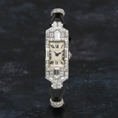 Cartier. A fine and early lady's platinum and diamond set manual wind cocktail watch Ref: 25619, Circa 1930