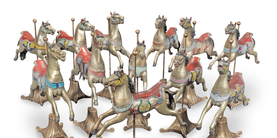 Attributed to Arthur Ernest Anderson (d. 1936) of Bristol: A set of twelve carved and polychrome wood carousel juvenile gallopers  probably early 20th century  (12)
