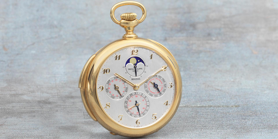 Patek Philippe. An extremely fine and very rare 18K gold keyless wind open face minute repeating perpetual calendar pocket watch with moon phase and 24 hour indication Ref: 962/1J-001, Purchased January 2001