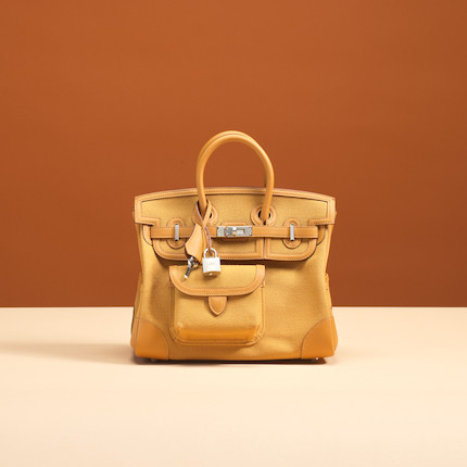 Bonhams : Hermès a Desert Canvas and Sesame Swift Leather Cargo