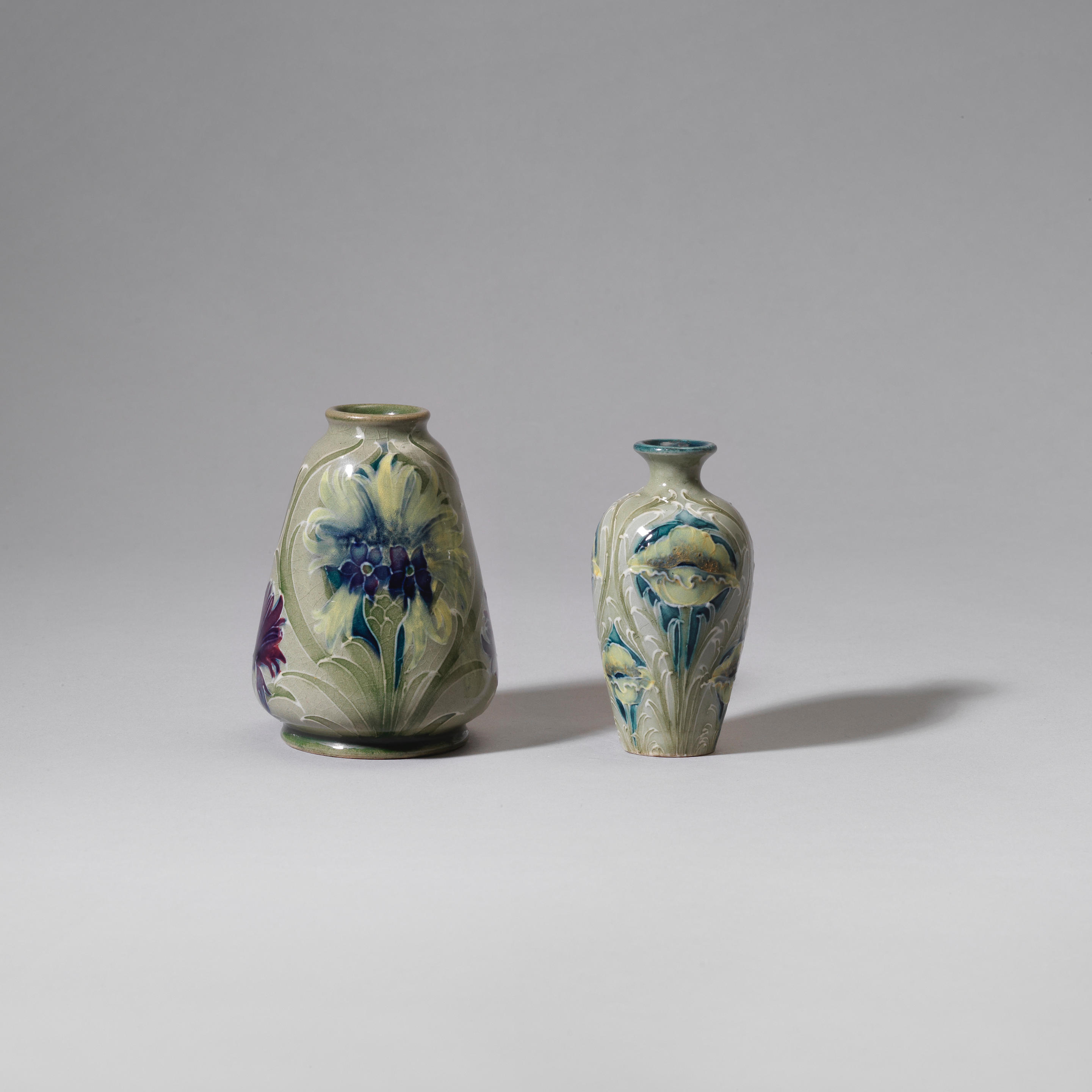 Bonhams : William Moorcroft Two 'Florian Ware' miniature vases, circa 1910