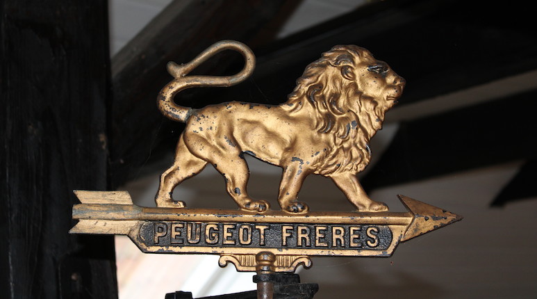 A Peugeot Freres cast metal sign,  (3) image 1