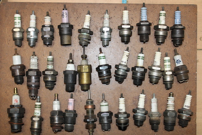 A collection of sparkplugs and related tins and boxes,  (Qty) image 3