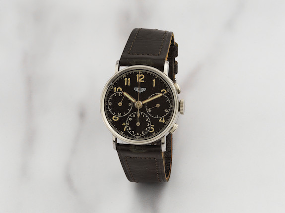 Heuer. Chronographe bracelet en acier mouvement mécanique Heuer. A stainless steel manual wind chronograph wristwatch  Circa 1950 image 1