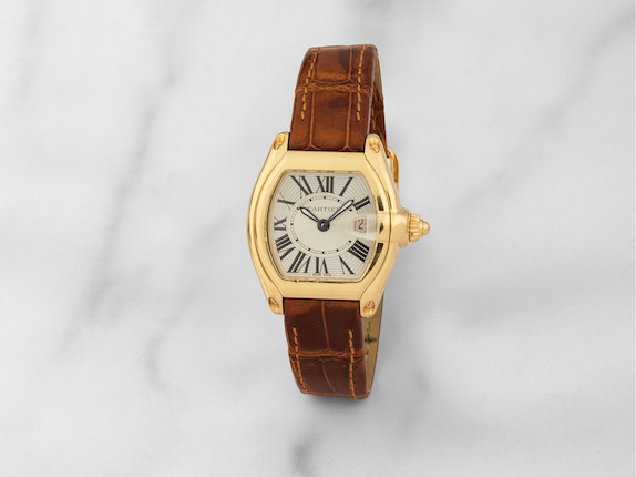 Cartier. Montre bracelet en or jaune 18K (750) avec date mouvement quartz Cartier. An 18K gold quartz calendar wristwatch   Roadster, Ref 2676, Purchased in August 2005 image 1