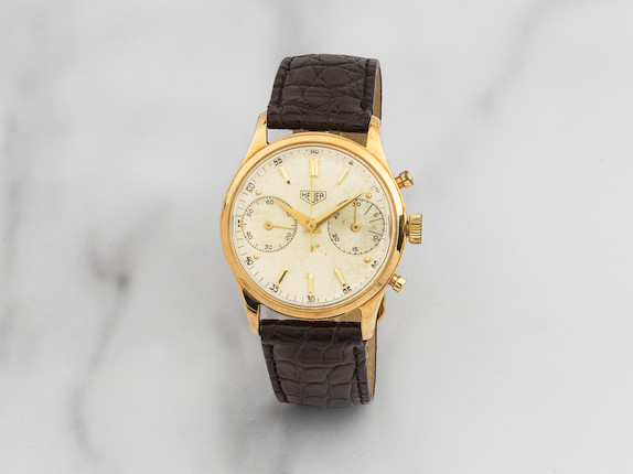 Heuer. Chronographe bracelet en or jaune 14K (585) mouvement mécanique Heuer. A 14K gold manual wind chronograph wristwatch  Circa 1960 image 1