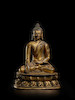 Thumbnail of A GILT COPPER ALLOY FIGURE OF BUDDHA  TIBET, 13TH/14TH CENTURY image 1