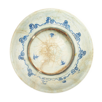 A large Safavid underglaze-painted and incised pottery dish Persia, 17th Century image 2