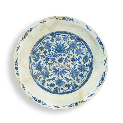 A large Safavid underglaze-painted and incised pottery dish Persia, 17th Century image 1