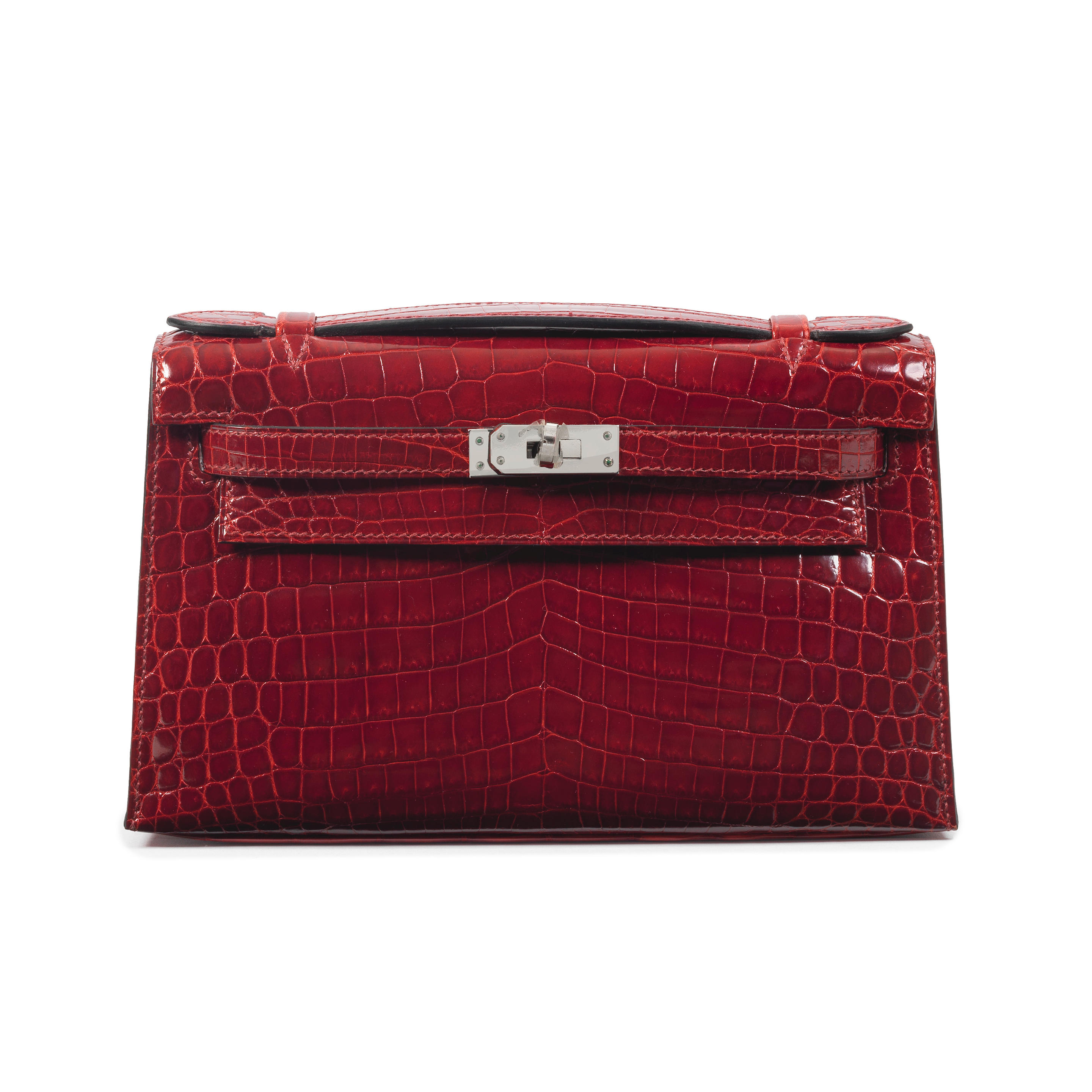Bonhams : Hermès a Shiny Rouge H Niloticus Crocodile Kelly Pochette 2008  (includes felt protector and dust bag)