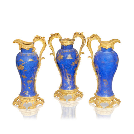 An important garniture of three Louis XV ormolu mounted Chinese powder-blue and gilt porcelain vases The porcelain Kangxi (1654-1722), the mounts mid-18th century (3) image 1