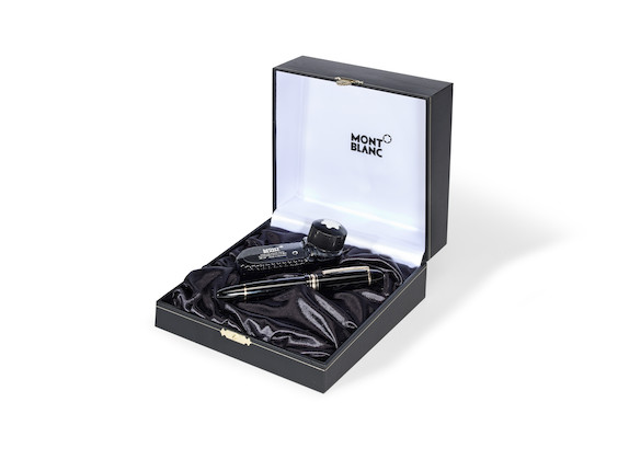 A Montblanc Meisterstück 149 black and gold fountain pen and ink set (2) image 1