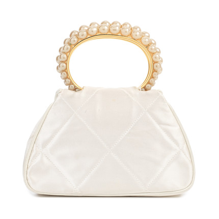 Bonhams : Karl Lagerfeld for Chanel a White Satin and Simulated Pearl Top  Handle Mini Flap Bag 1989-91 (includes serial sticker, authenticity card  and dust bag)