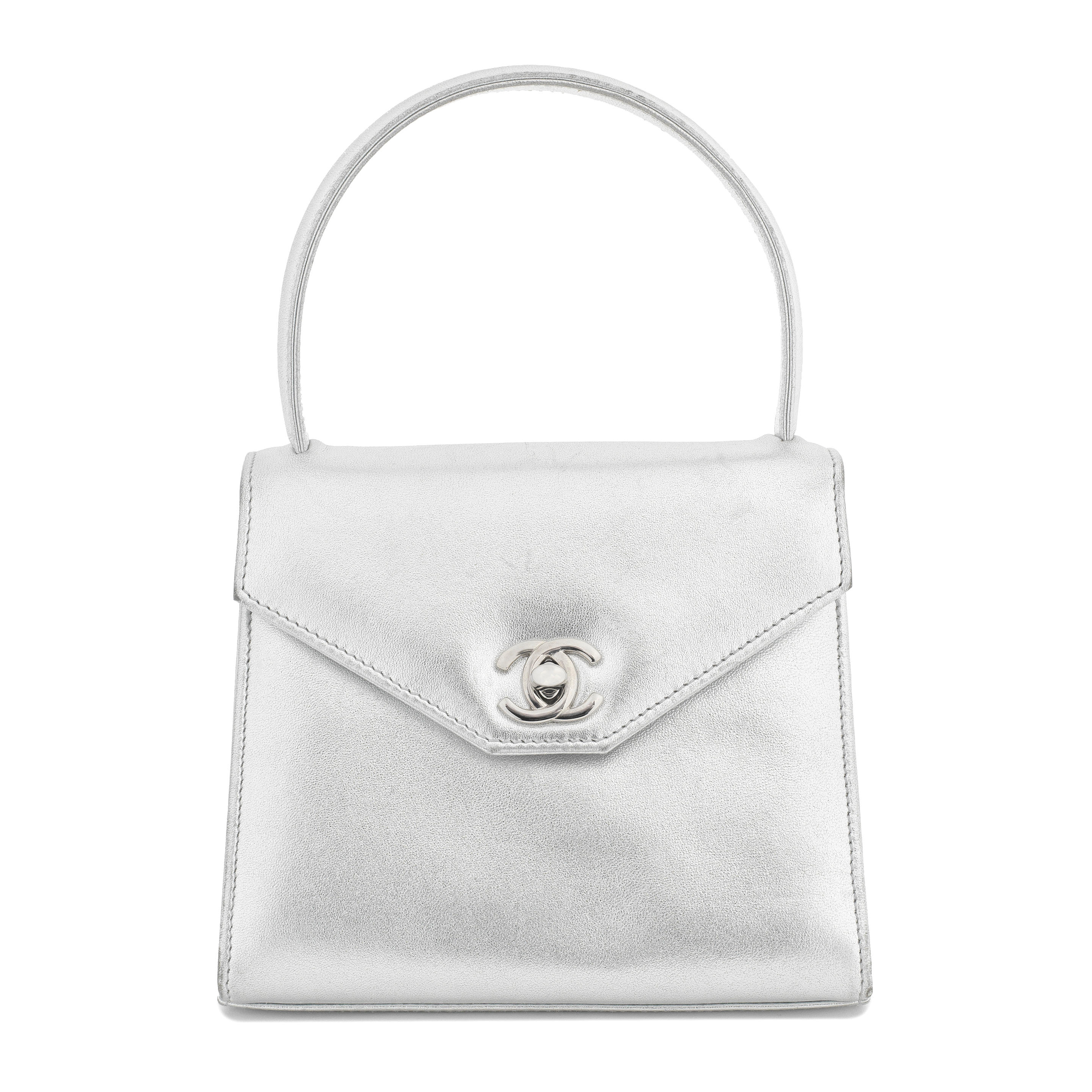 Bonhams : Karl Lagerfeld for Chanel a Metallic Silver Top Handle Mini Kelly  Bag 1996-97 (includes serial sticker, authenticity card, care booklet and  dust bag)