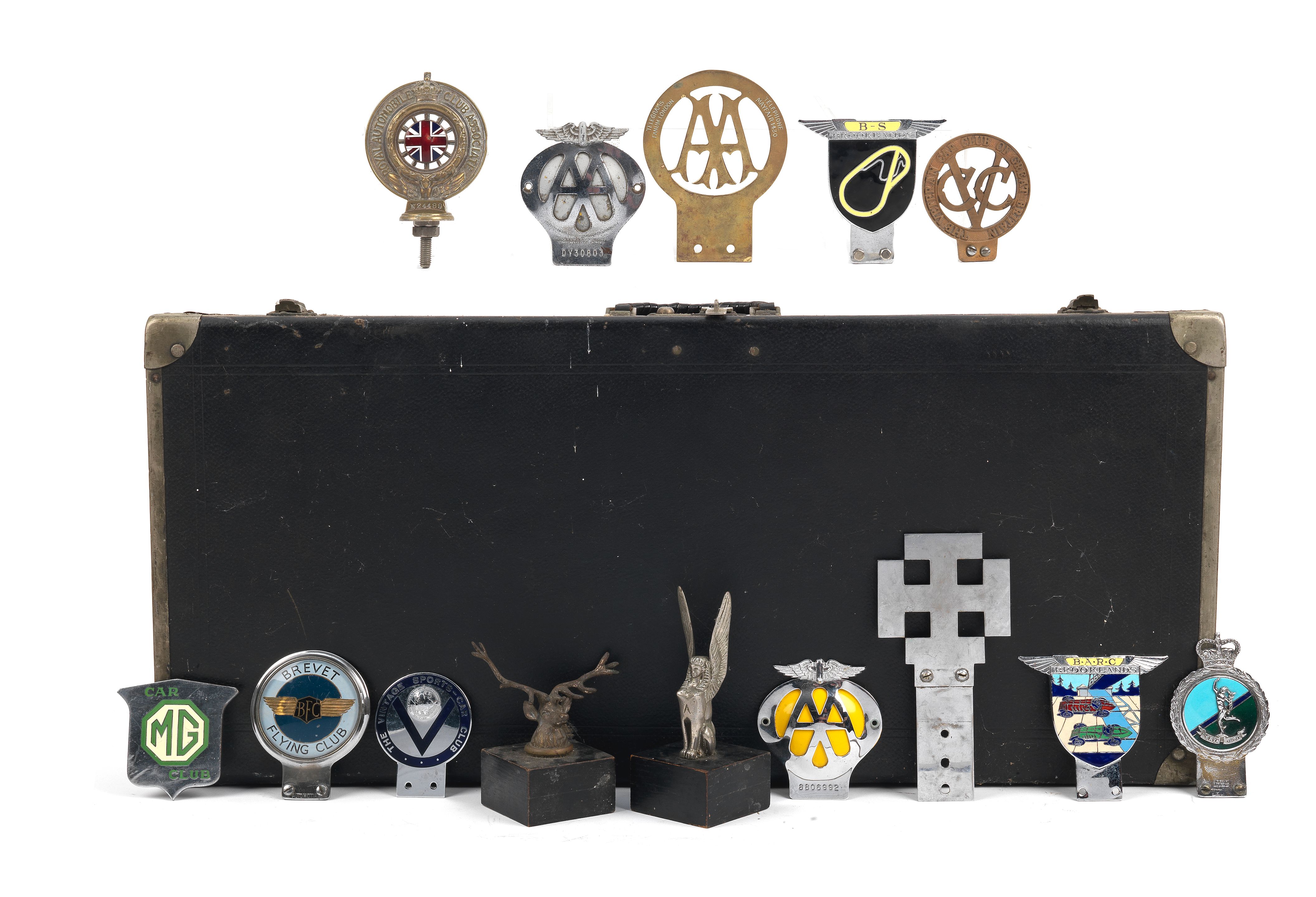 Assorted car badges,