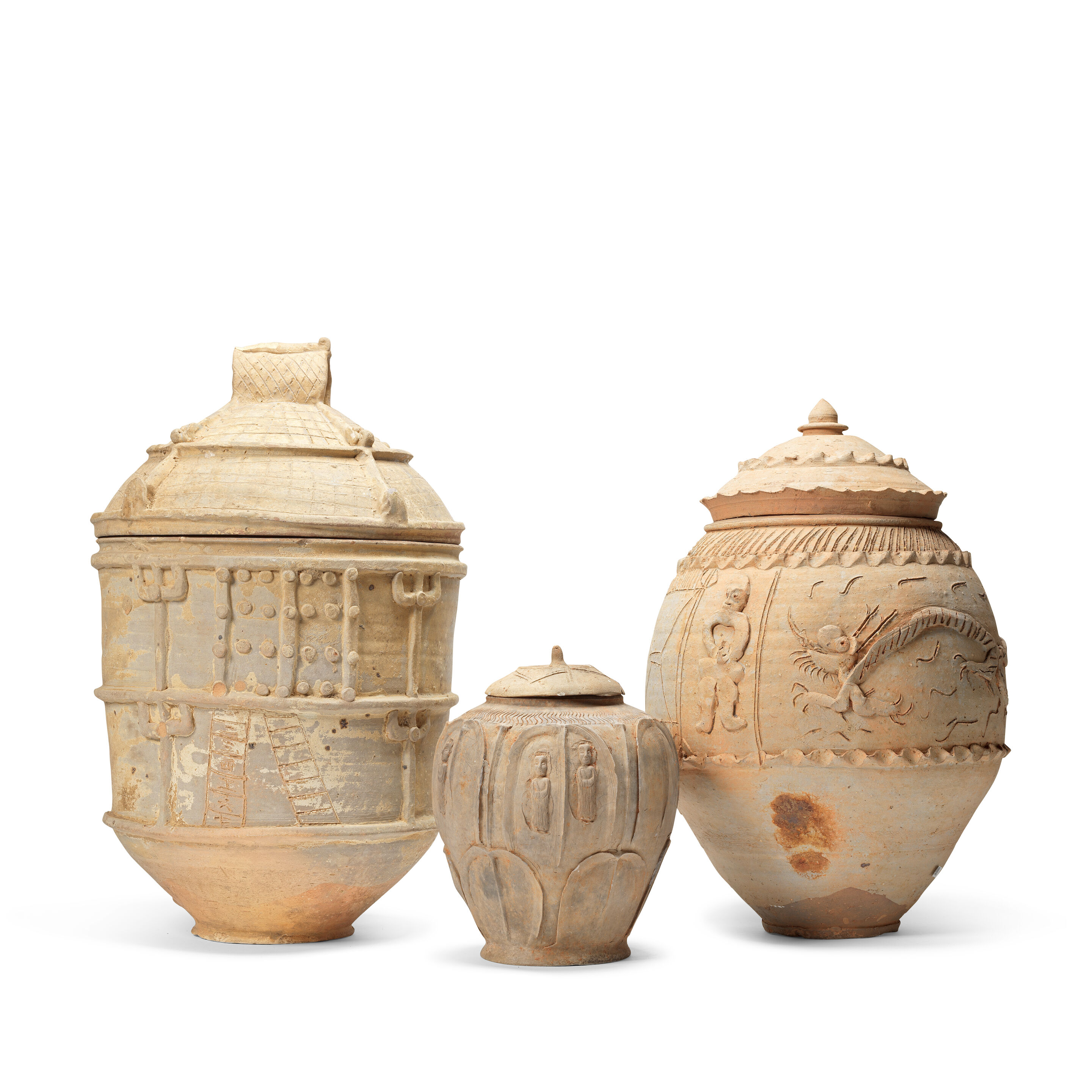 THREE POTTERY JARS AND COVERS Yuan Dynasty