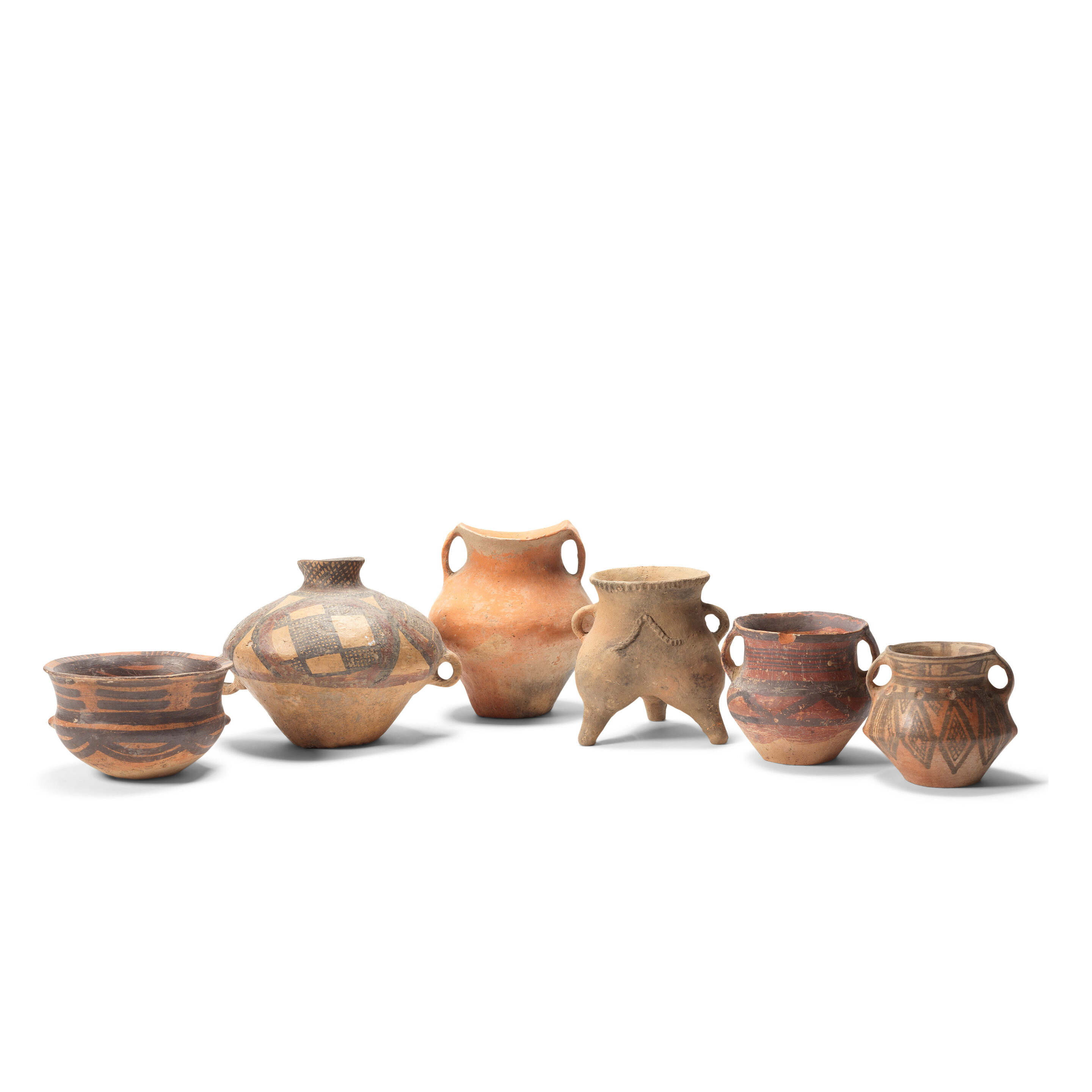A GROUP OF SIX POTTERY JARS Neolithic period
