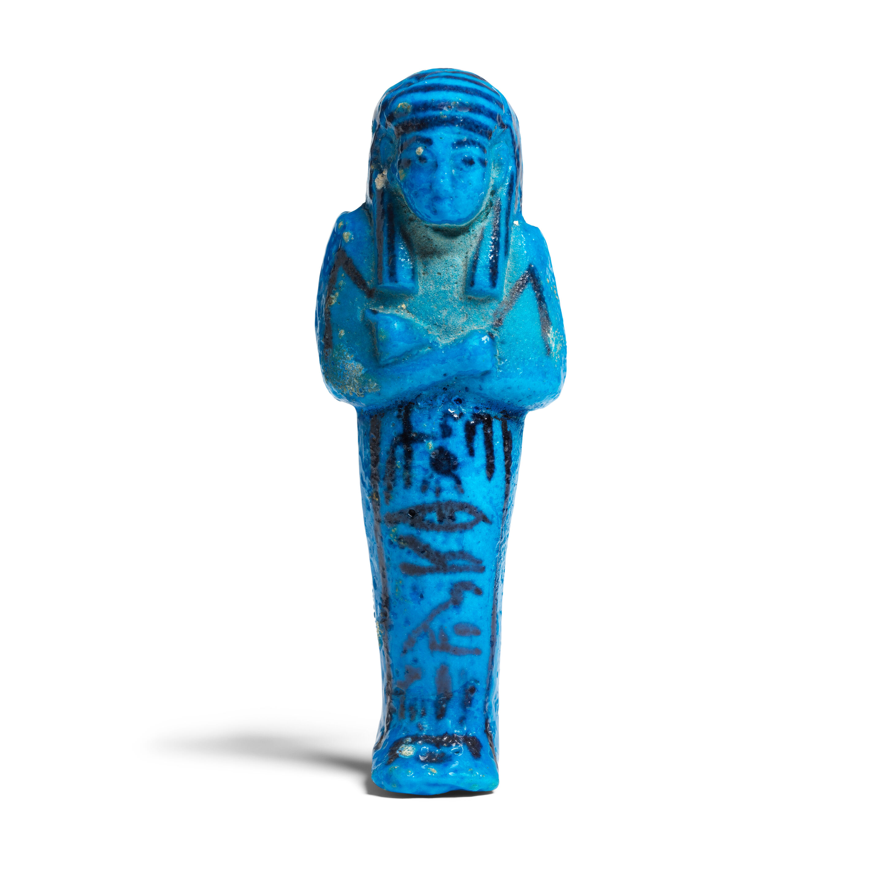 An Egyptian bright blue faience shabti for Tayu-Heret