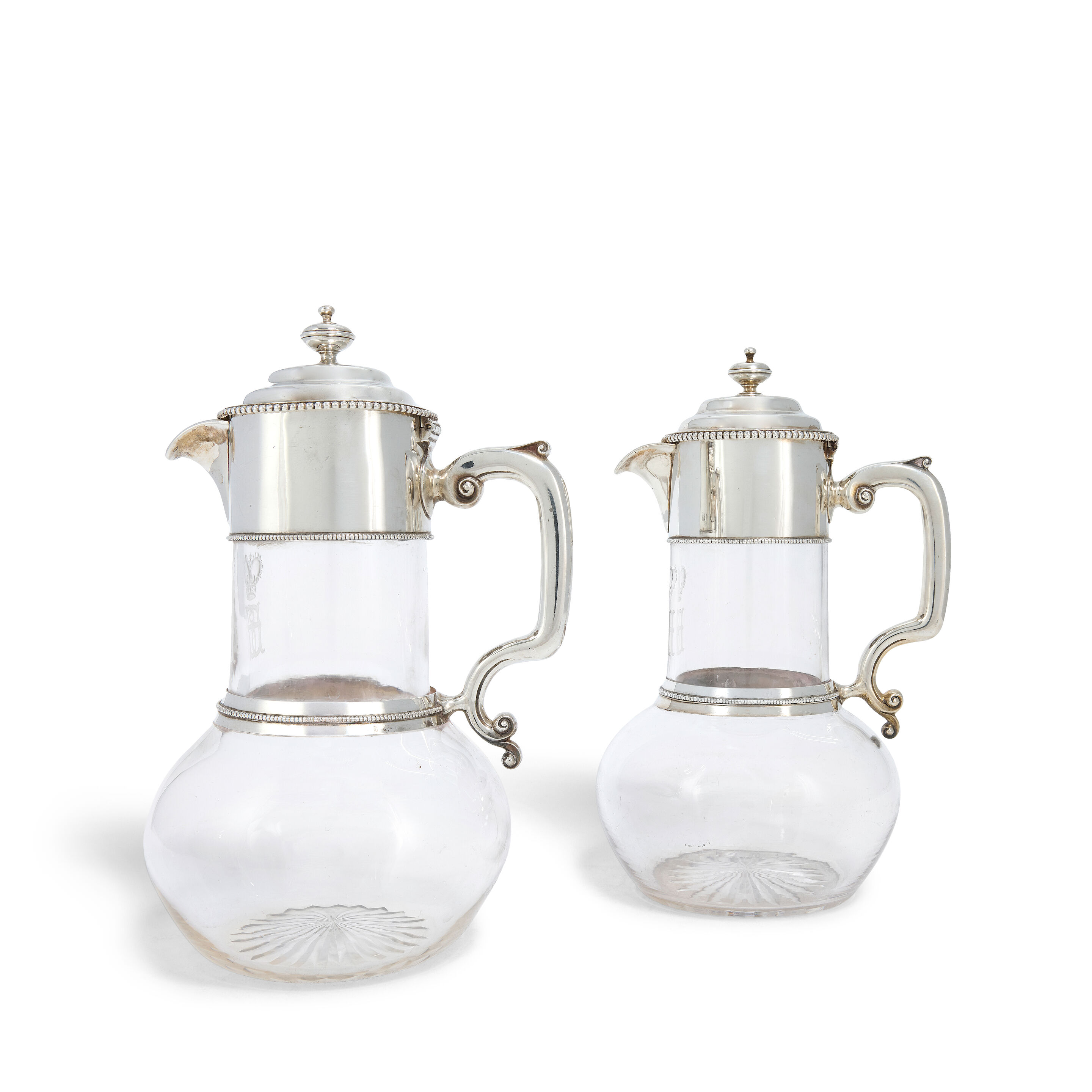 A near pair of Victorian silver-mounted glass claret jugs John Figg, London 1857 and 1860, also incused stamped 2126 and 3453 (2)