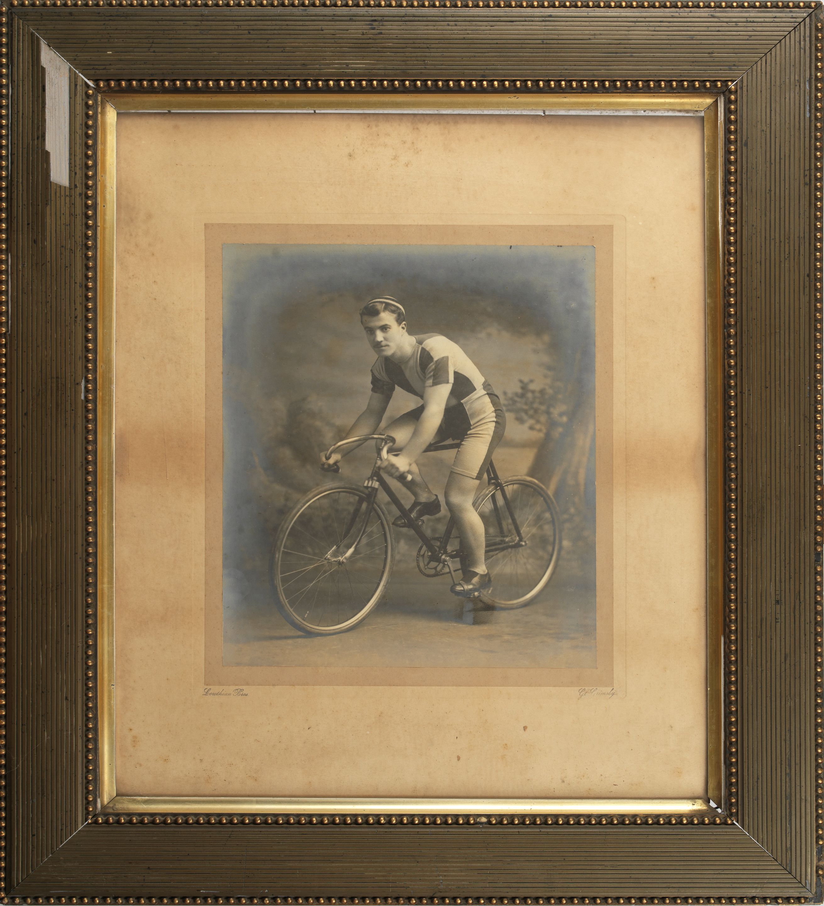 Assorted framed cycling display items,