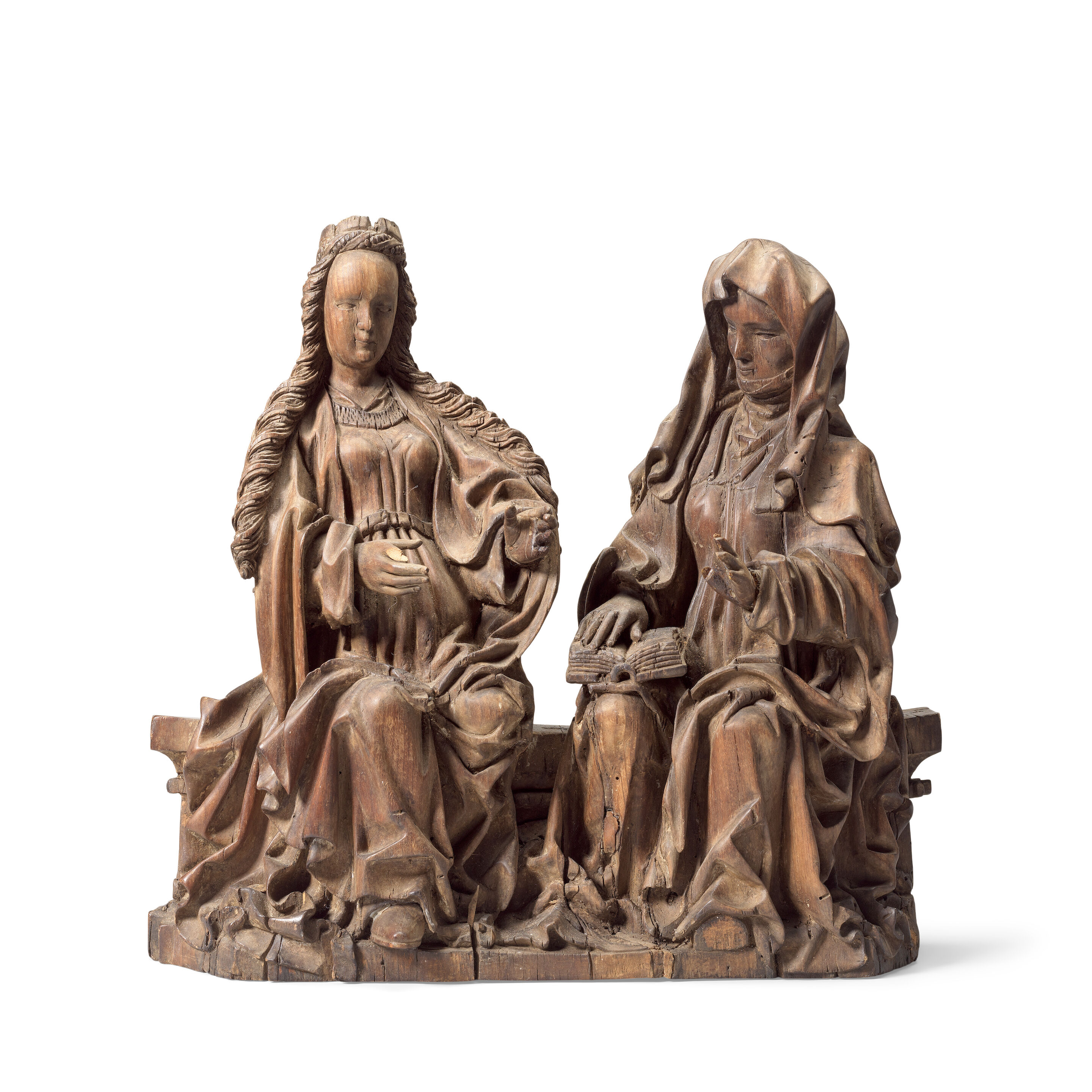 A carved oak figural group depicting Saint Anne teaching the Virgin to read South Netherlands, Brabant or perhaps Limburg, circa 1500