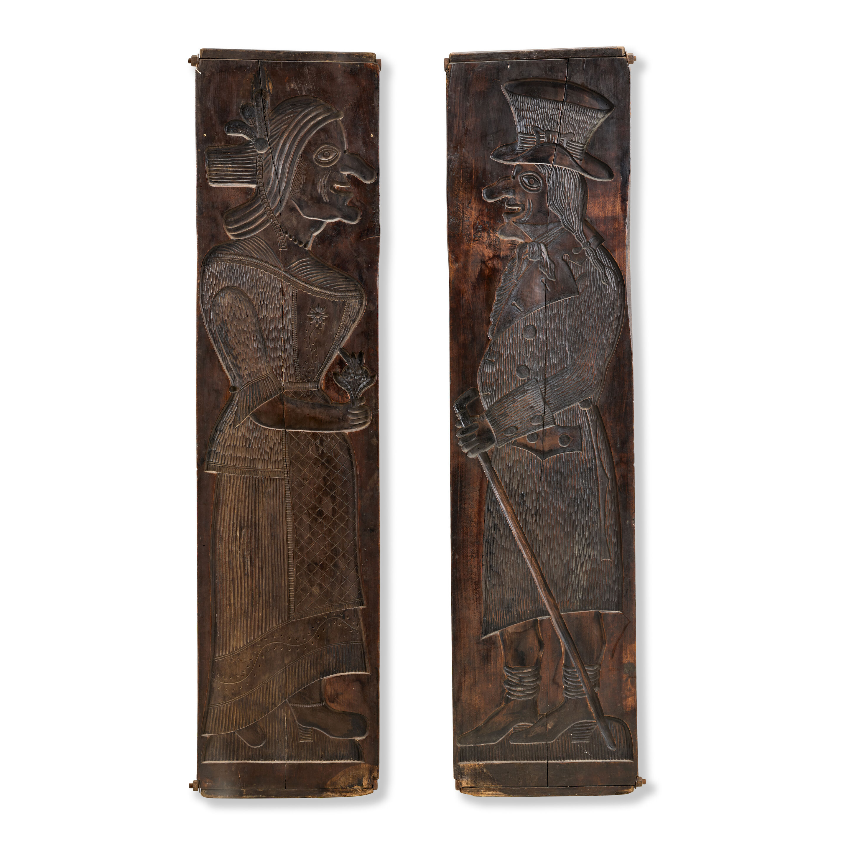 An extremely large 19th century double-sided carved treen gingerbread mould depicting Punch and Judy