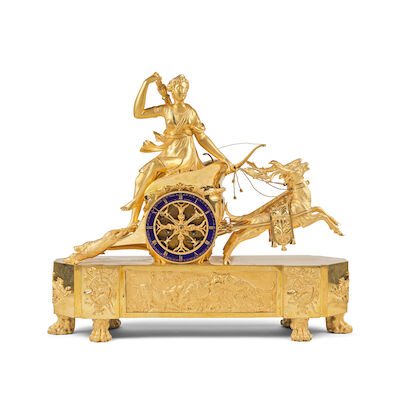 Rare pendule en bronze doré figurant le 'Char de Diane', début XIXe siècle An unusual early 19th century French ormolu figural clock 'Diana's Chariot' A Paris