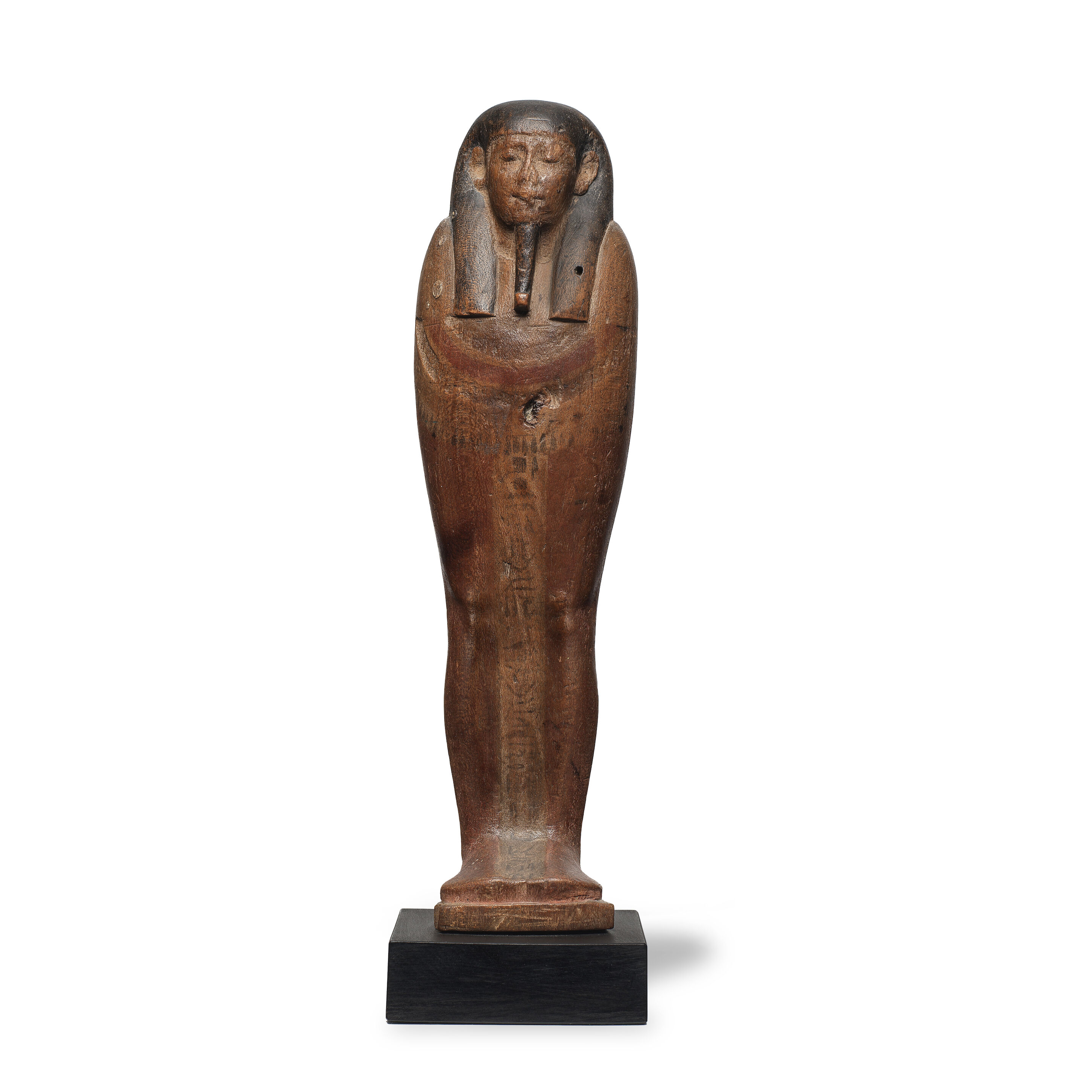 An Egyptian wood figure of Ptah-Sokar-Osiris