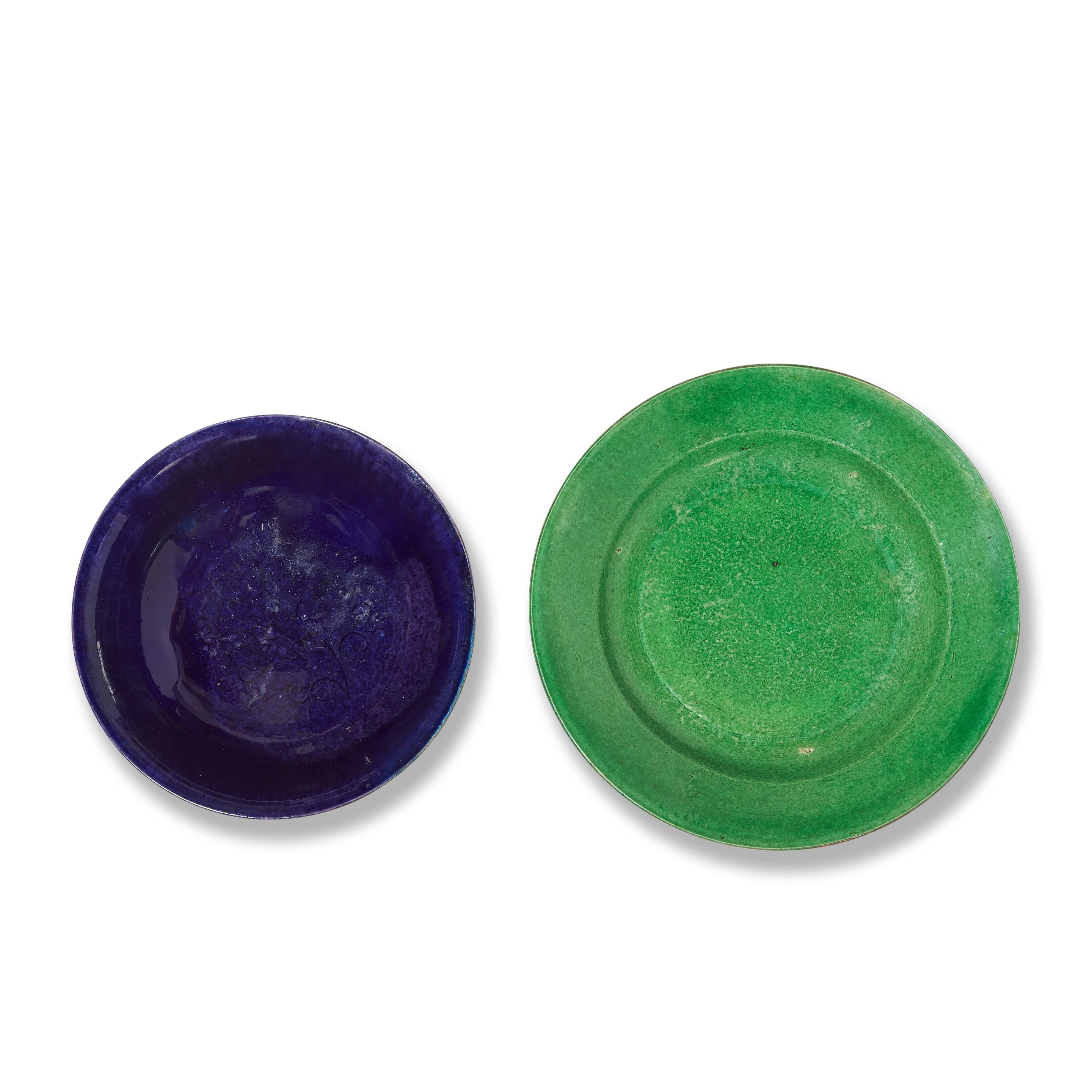 AN AUBERGINE-GLAZED 'LOTUS' BOWL AND A BISCUIT GREEN-GLAZED DISH Kangxi