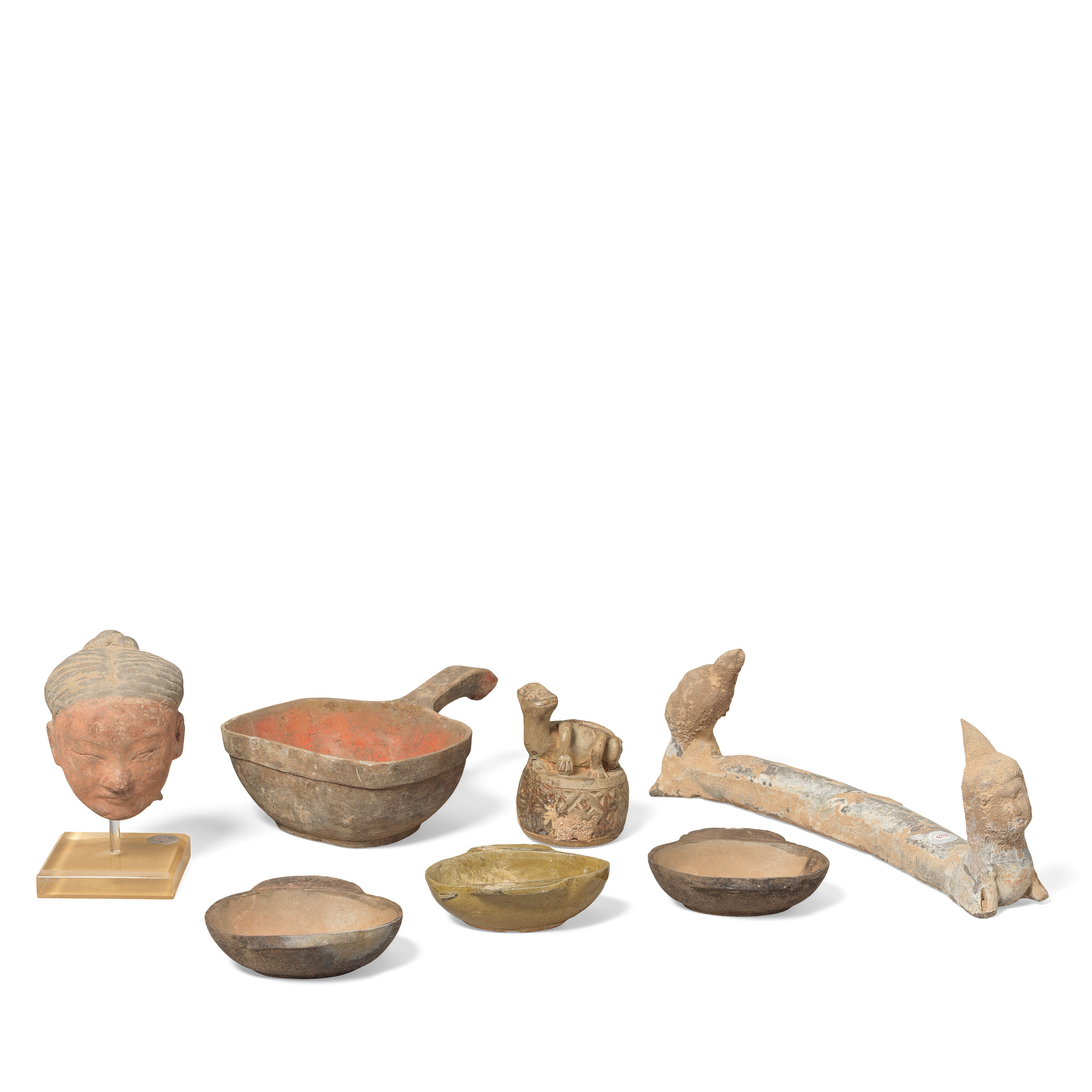 A VARIED GROUP OF EARLY POTTERY WARES Han Dynasty