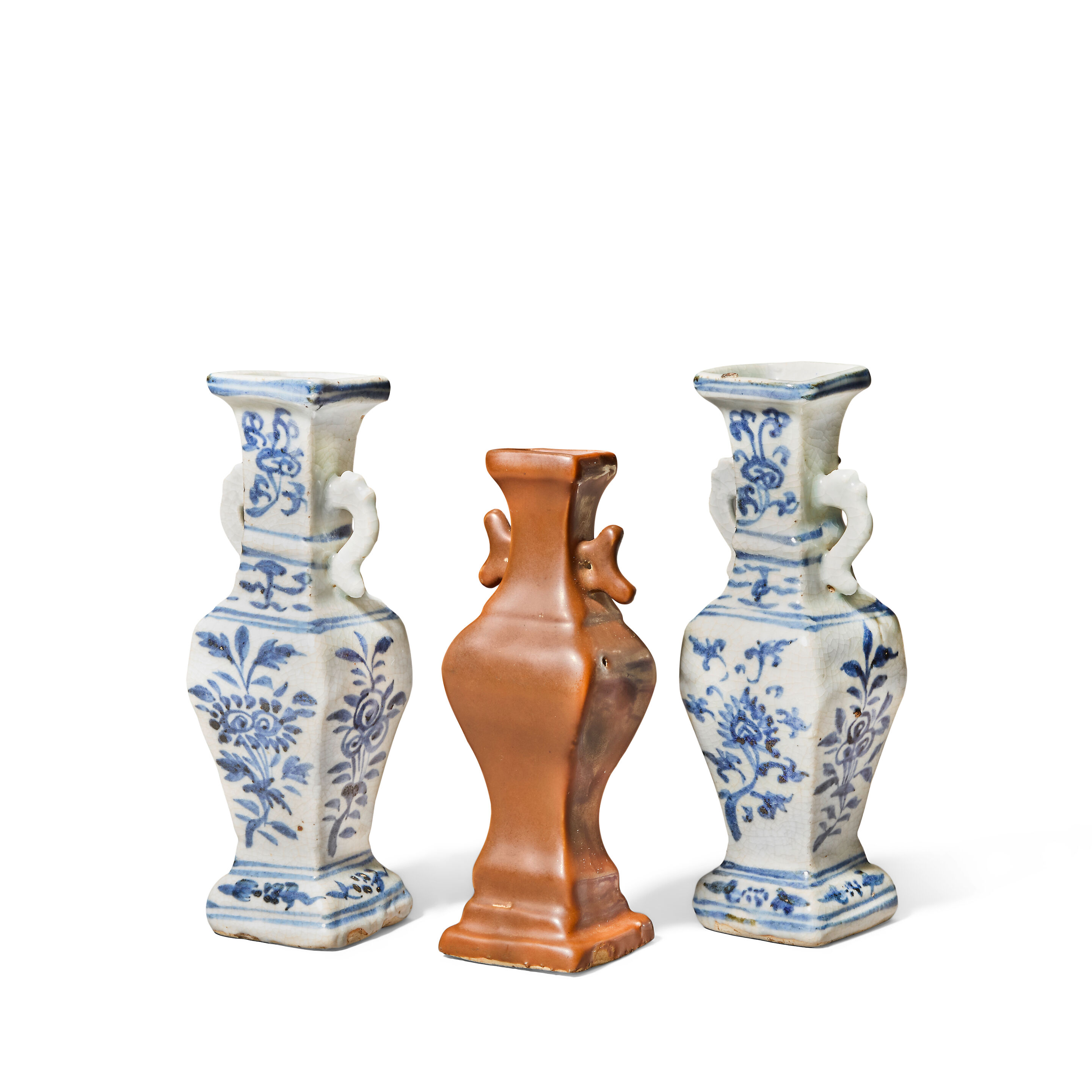 A NEAR PAIR OF BLUE AND WHITE VASES AND A CHOCOLATE-BROWN-GLAZED VASE Ming Interregnum, Zhengtong to Tianshun 1436-1464
