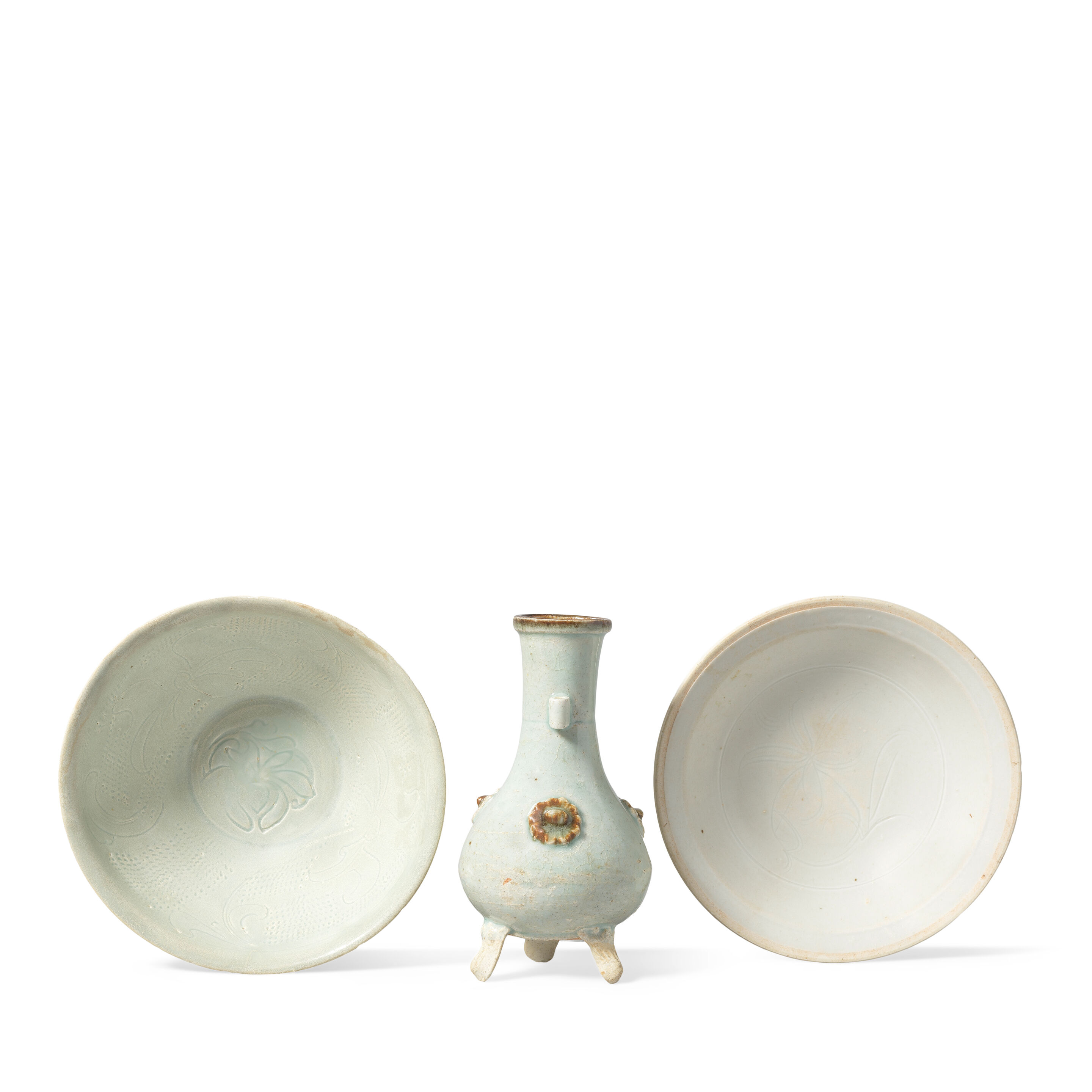 TWO QINGBAI-GLAZED BOWLS AND A QINGBAI-GLAZED VASE Song/Yuan Dynasty