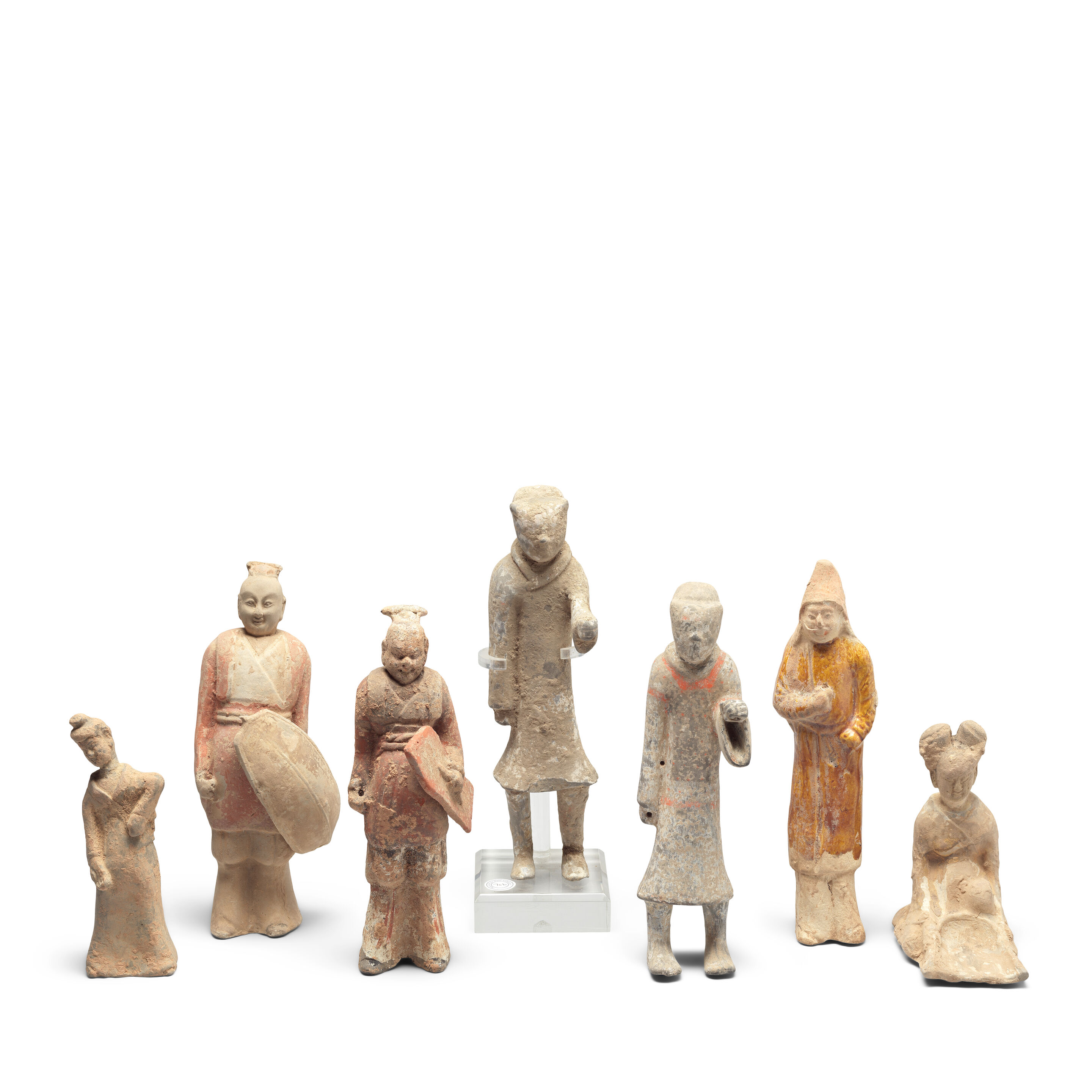A GROUP OF SEVEN TERRACOTTA FIGURES Han Dynasty and later