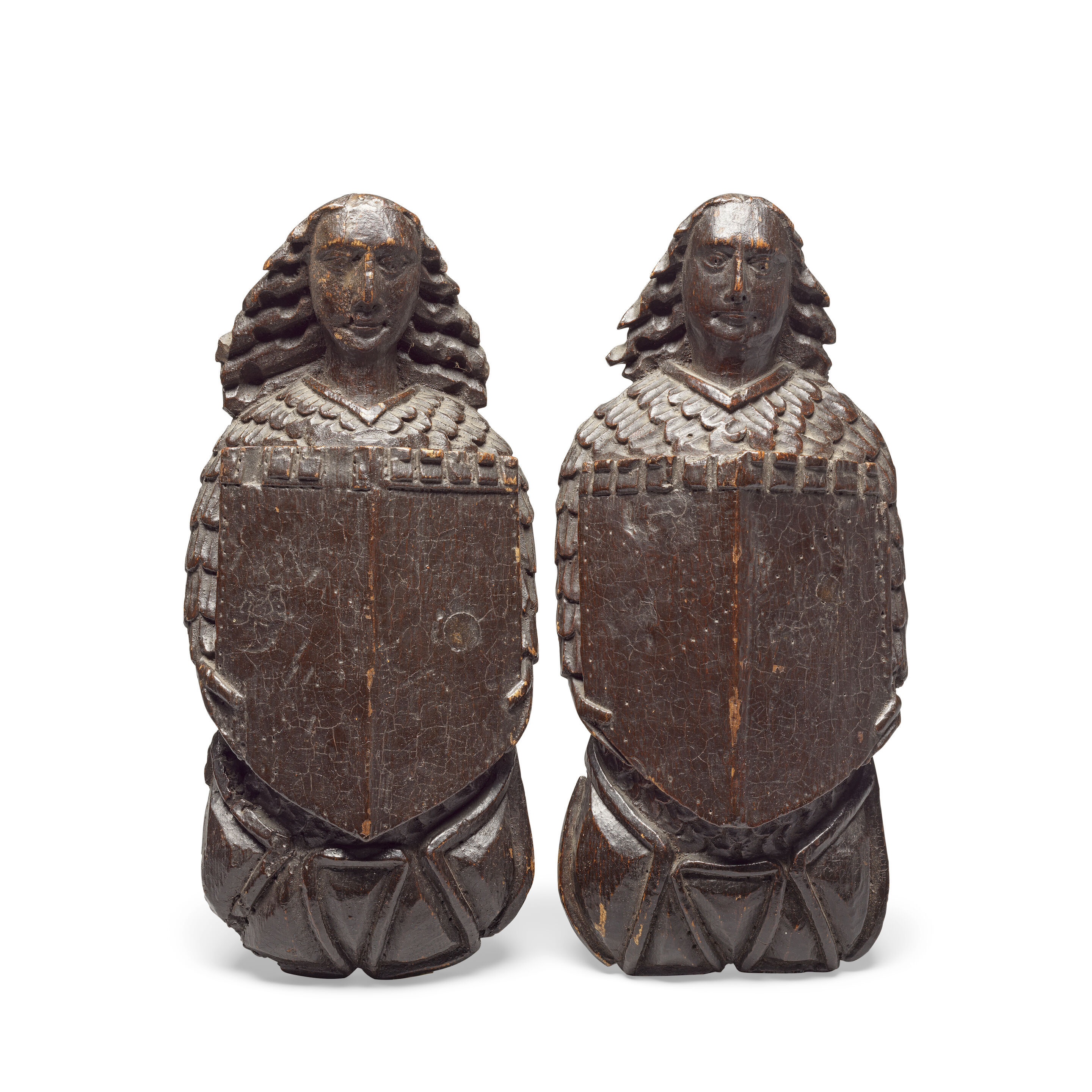 A pair of 15th century English oak roof or hammer beam angels
