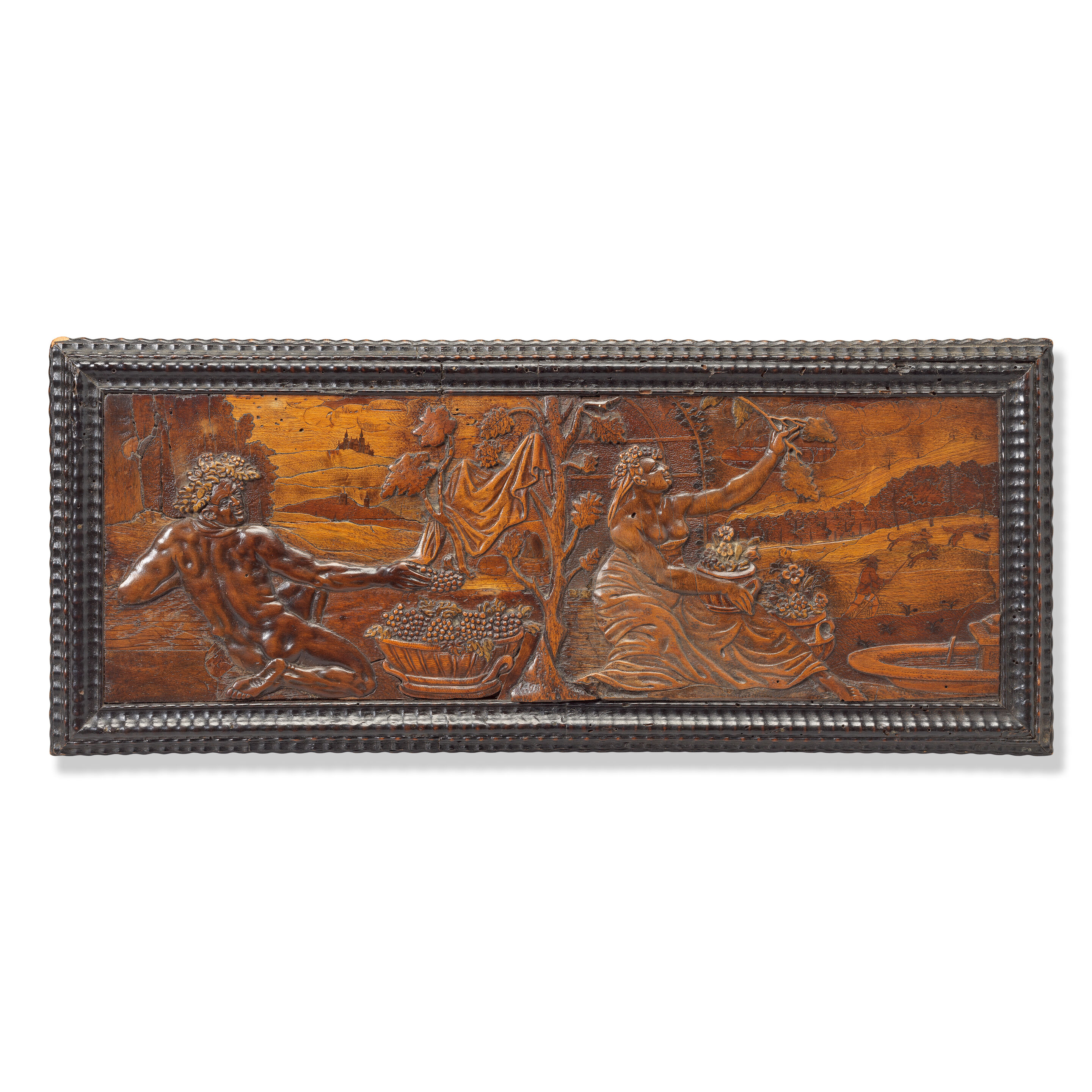 A carved boxwood, walnut and fruitwood inlaid relief panel of Bacchus and Ceres 17th century, Eger, possibly Adam Eck, or Johann Georg Fischer (1587-1664)