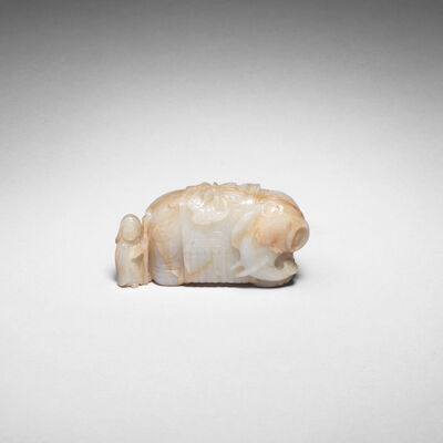 A PALE GREEN JADE CARVING OF AN ELEPHANT AND 'FOREIGNER' 17th/18th century