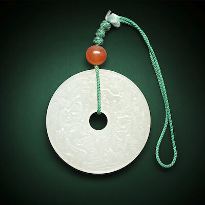 AN ARCHAISTIC WHITE JADE 'CHILONG' DISC, BI Qing Dynasty