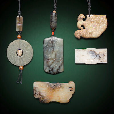 A GROUP OF FIVE ARCHAISTIC JADE PLAQUES Ming/Qing Dynasty and later (5)