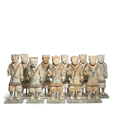 A COLLECTION OF TEN PAINTED POTTERY ATTENDANTS Han Dynasty (10)