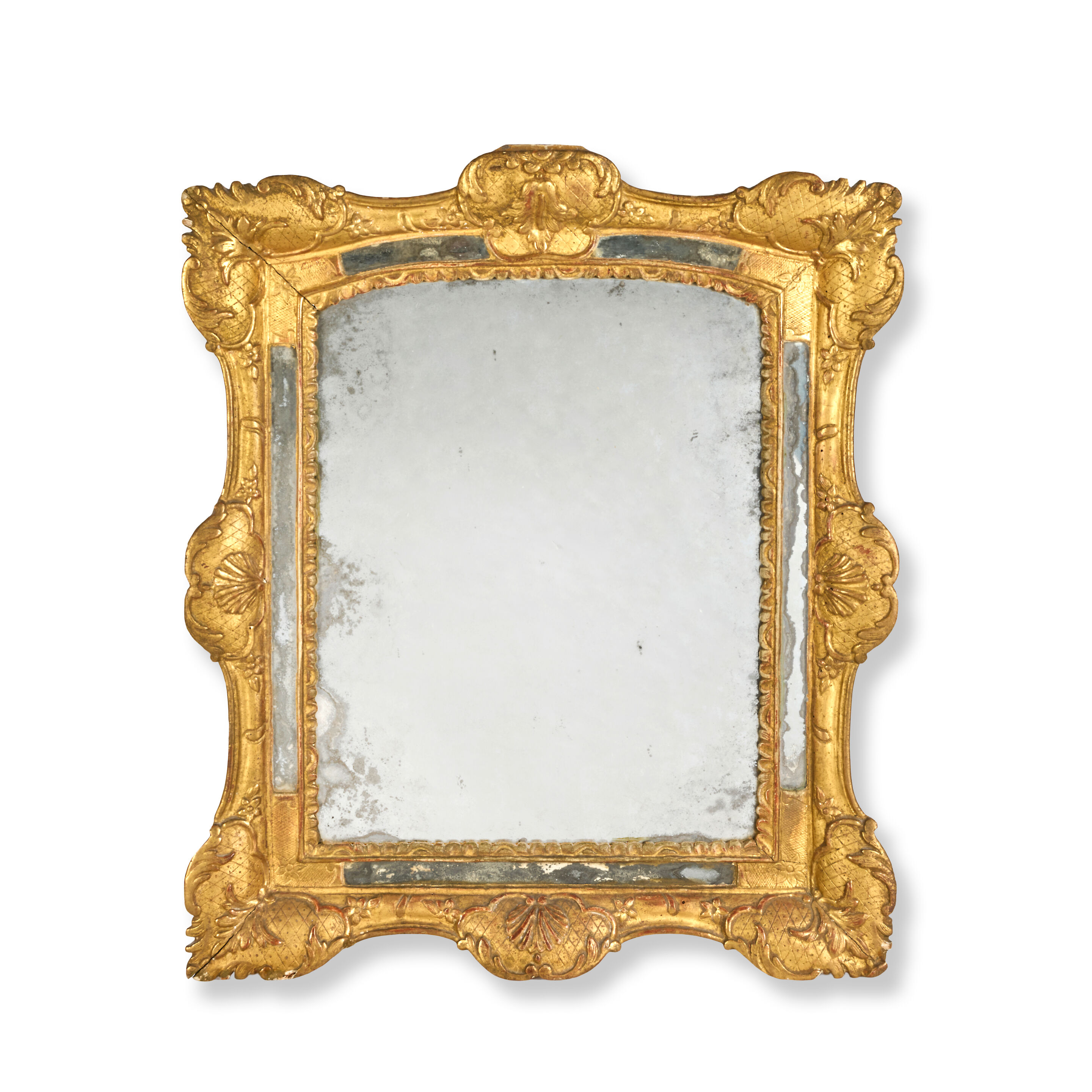 A late Louis XIV/Regence giltwood and gilt gesso marginal mirror 1705-1720