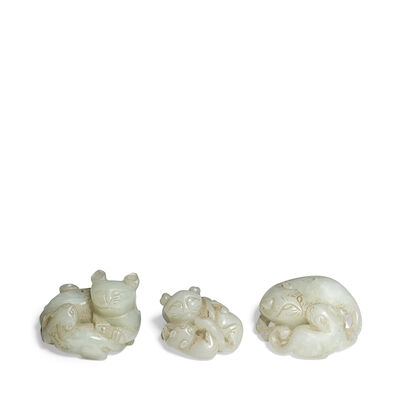 THREE PALE GREEN JADE 'CAT GROUP' CARVINGS 19th century (3)