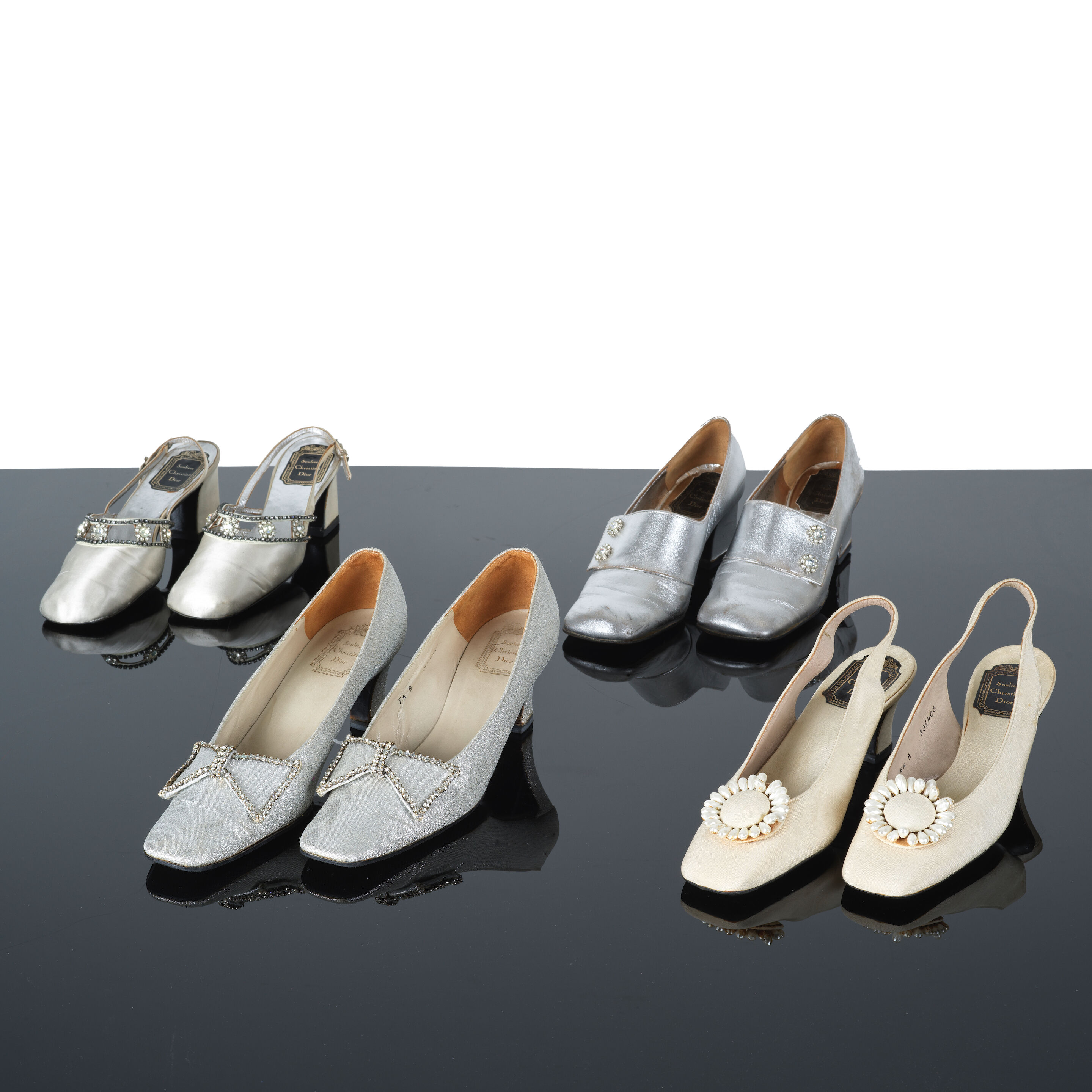 Souliers Christian Dior, circa 1960-1970. Quatre paires de souliers, petits talons. Souliers Christian Dior, circa 1960. Four pairs of shoes, with low heels. Souliers Christian Dior, circa 1960-1970. Four pairs of shoes, with low heels.