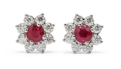 A pair of ruby and diamond ear studs set with rubies and diamonds, mounted in 18k white gold. D/VVS. (2)